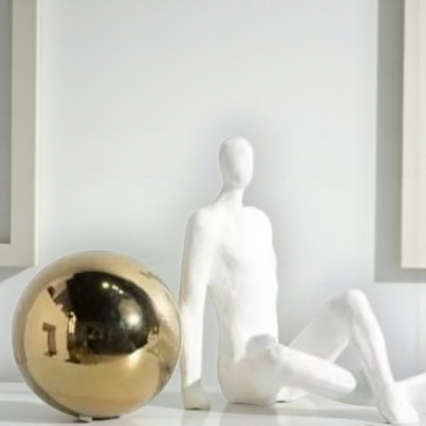 Modern Abstract Sitting Figure with Golden Sphere – Minimalist Home Decor