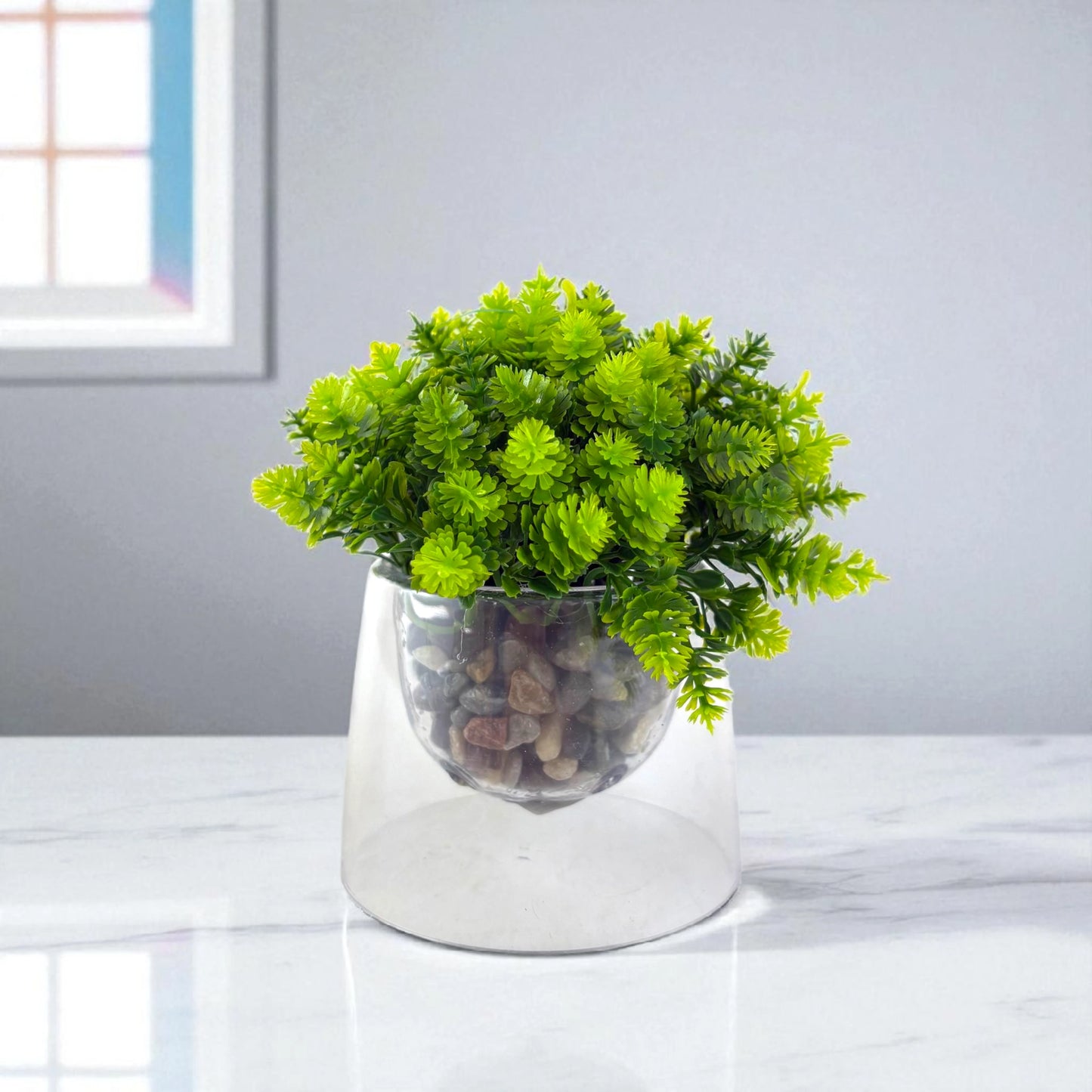 Artificial Green Plant in Clear Glass Pot – Pebble Base Accent