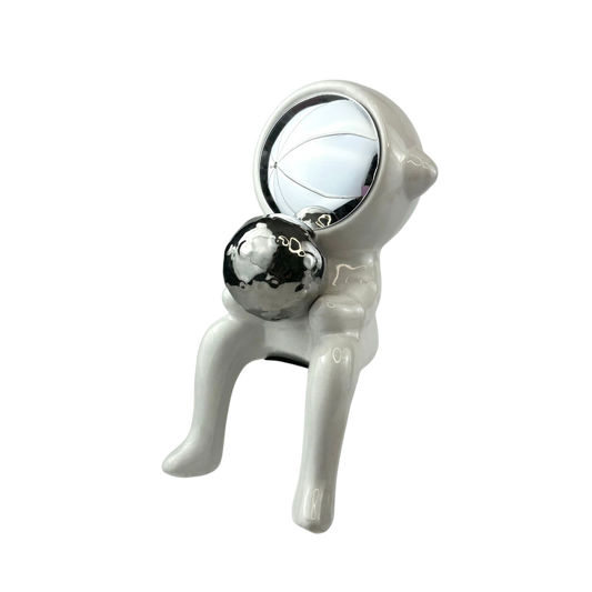 White & Chrome Seated Figurine – Abstract Decor with Sphere