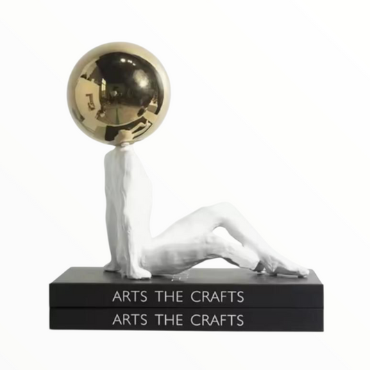 Modern Abstract Sitting Figure with Golden Sphere – Minimalist Home Decor
